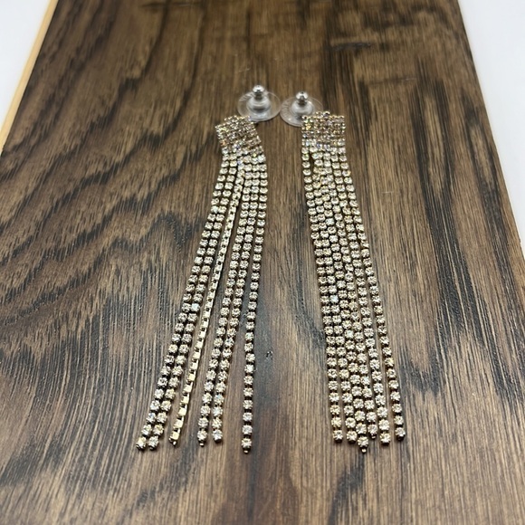 Dangling Rhinestones Pierced Earrings.  6 rows of rhinestones 3” Articulated - Picture 1 of 8